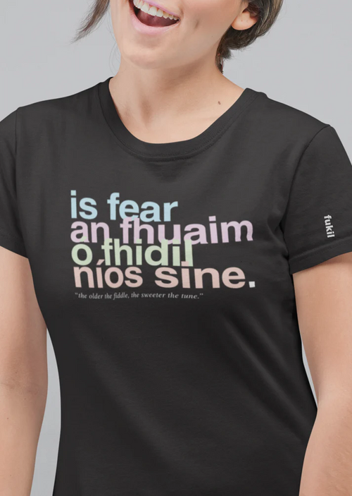 Fukil T Shirt seanfhocail- is fear an fhuaim (Black)